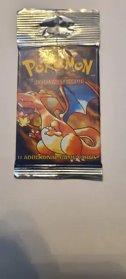 1999 Pokemon Base Set Unlimited Long Crimp Charizard Booster Pack LITE, SEALED - Image 1