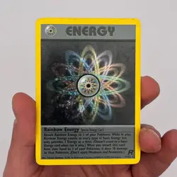 Rainbow Energy 17/82 Holo Rare SWIRL Unlimited Team Rocket Pokemon Card - Image 1