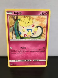 Togepi 136/214 Pokemon Unbroken Bonds Common - Image 1