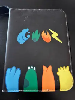 Assorted Pokemon card collection in binder - Image 1
