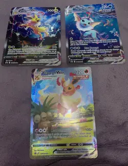 Pokemon Jumbo Cards Flareon VMAX, Vaporeon VMAX, Jolteon VMAX Set of 3 - Image 1