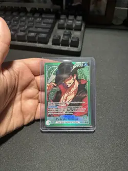 One Piece OP14 The Azure Sea’s Seven - Dracule Mihawk OP14-020 Leader Alt Art - Image 1