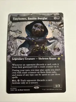 Tinybones, Bauble Burglar (Borderless) #324 (NM) Foundations FDN Magic MTG - Image 1