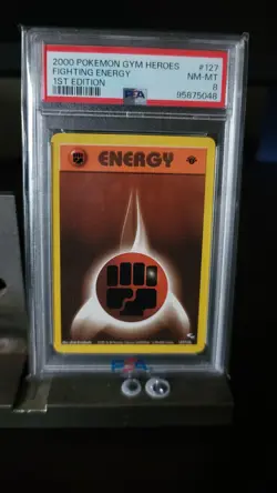 2000 POKEMON GYM HEROES 1ST ED #127 FIGHTING ENERGY PSA 8 - Image 1