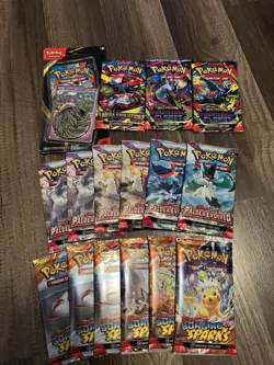 16 Pokemon TCG Booster Pack Lot Assorted with 1 Promo And Coin Pack! - Image 1