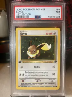 1st Edition Eevee PSA 7 2000 Pokemon Team Rocket Near Mint TCG - Image 1