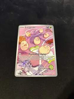 Pokemon Exeggcute TCG Holo Rare Card 192/191 Sv08: Surging Sparks Illustration - Image 1