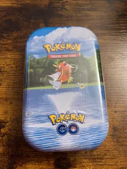 Pokemon TCG Trading Cards GO Mini Tin-Magikarp 2 Booster Packs & 1 Art Card Game - Image 1
