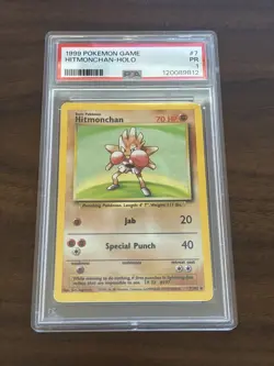 Vintage 1999 Pokemon TCG Base Set Hitmonchan Holo Unlimited #7 - PSA 1 - Image 1
