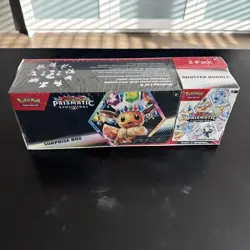 Pokemon Prismatic Evolutions Surprise Box With Booster Bundle - Image 1