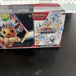 Pokemon Prismatic Evolutions Surprise Box With Booster Bundle - Image 3