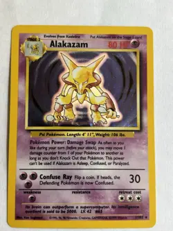 1999 Base Set Unlimited Alakazam (1/102) holo Pokemon trading card. RARE NM - Image 1