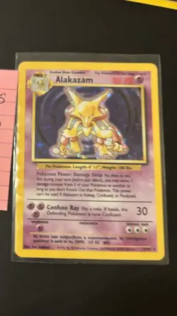 1999 Base Set Unlimited Alakazam (1/102) holo Pokemon trading card. RARE NM - Image 2