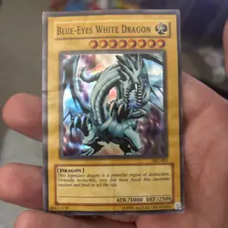 1996 TCG Unlimited BLUE-EYES WHITE DRAGON HOLO RARE #SKE-001 DMG - Image 1
