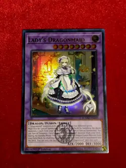Yu-Gi-Oh! - Lady's Dragonmaid - BLMM-EN049 - 1st Edition - Ultra Rare - Unplayed - Image 1