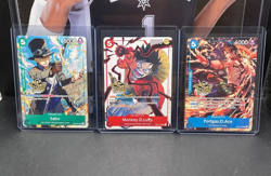 Monkey D Luffy, Sabo, Portgas.D.Ace 3rd Anniversary Stamped Set One Piece TCG - Image 1
