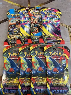Pokemon TCG 🔥🔥 4 MEGA EVOLUTIONS AND 4 PHANTASMAL FLAMES SLEEVED HANGAR PACKS - Image 1