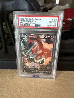 PSA 8 - 2022 POKEMON SWORD & SHIELD BRILLIANT STARS 154 FA/CHARIZARD V - Image 1