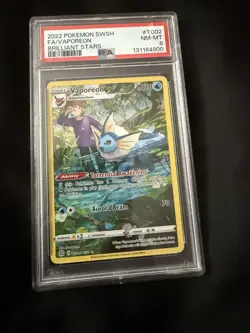 Pokemon TCG Brilliant Stars Vaporeon Ultra Rare Holo Card TG02/TG30 PSA 8 - Image 1