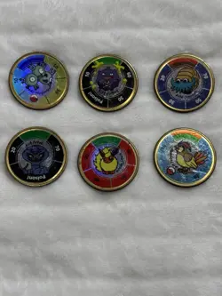 These are vintage 1999 Hasbro Pokemon Battling Coins Various Characters Lot #6 - Image 1