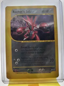 Rocket’s Scizor #4 Best of Game Promo 2002 Pokemon Card Damaged - Image 1