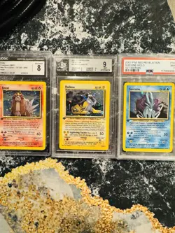 Pokemon TCG Neo Revelation First Edition Legendary Dogs - Image 1