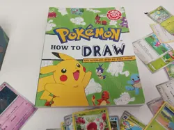 Pokemon Card Bundle with Tins and How to Draw Book - Mixed Cards Some HOLO Used - Image 3