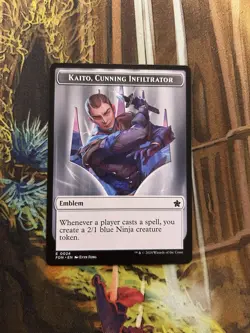 Emblem - Kaito, Cunning Infiltrator 24 // 12 MTG NM Foundations - Image 1