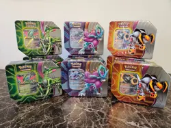 Pokemon TCG: Paradox Clash/Destinies—Iron Leaves-Walking Wake-Gouging Fires Tins - Image 1