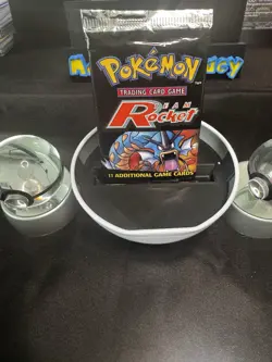 Wizards of the Coast Pokemon TCG Team Rocket Booster Pack - 11 Cards 742818061742 - Image 1