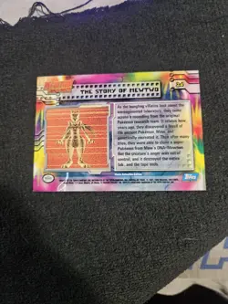 1999 Topps Pokemon Mewtwo Strikes Back #24 The Story of Mewtwo Black Logo LP - Image 2