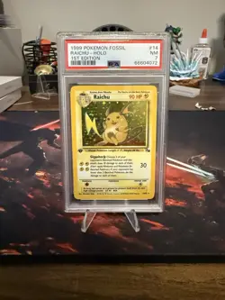 Pokemon TCG Fossil Raichu 1st Edition PSA 7 - Image 1