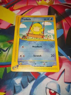 Psyduck 104/147 Aquapolis Common Pokemon TCG High Grade NM - Image 1