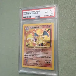 1999 Pokemon Base Set #4 Charizard Holo PSA 8 - Image 1