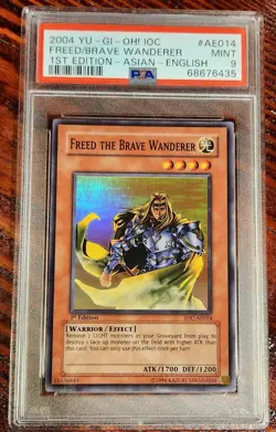 2004 Yu-Gi-Oh! IOC #AE014 Freed Brave Wanderer 1st ed Asian/English PSA 9 - Image 1