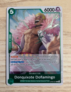 OP09-031 Donquixote Doflamingo English R One Piece TCG Card Game - Image 1