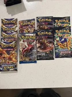 Pokemon TCG 10 Sealed Booster Packs - Image 1