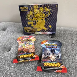 Pokemon ETB Surging Sparks New Sealed PLUS 2 additional booster packs - Image 1