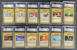 Lot of (12) 1999 Pokemon Assorted CGC Graded Trainer Cards w/ Gambler Recycle - Image 1