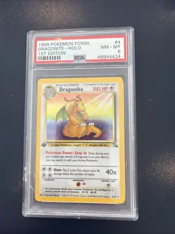 1999 POKEMON FOSSIL 1ST ED #4 DRAGONITE-HOLO PSA 8 - Image 1