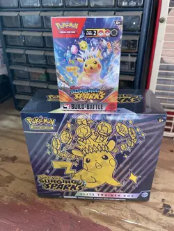 Pokemon TCG Scarlet & Violet Surging Sparks Pokemon Sealed ETB And Battle Pack - Image 1
