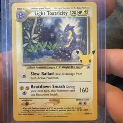 Light Toxtricity SWSH137 SWSH: Sword & Shield Promo Cards Holo - Image 1