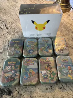 Celebrations Pokemon Lot ETB And Full Set Of Tins - Image 1