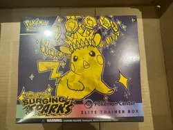 Surging Sparks Pokemon Center ETB Elite Trainer Box - **Tiny corner tear** - Image 1