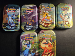 Pokemon Prismatic Evolutions Mini tins Empty - Image 1