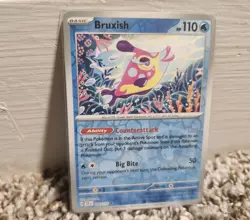 Bruxish 049/191 Reverse Holo Pokemon TCG: Surging Sparks Near Mint (NM) - Image 1