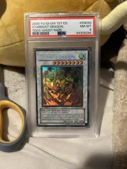 2008 Yu-Gi-Oh! 1st Ed. Stardust Dragon TDGS-Ghost Rare #EN040 NM-MT PSA 8 - Image 1