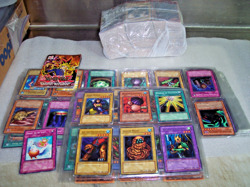 1996 Yu Gi Oh Konami 870 Cards (122 With Plastic Sleeves+ Game Book - Image 1