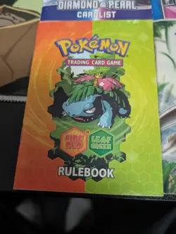 Pokemon Rule Book/Card List Lot with 6 Booklets, 2 Old Playmats, & Deck Box - Image 3