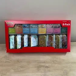 Pokemon TCG: Scarlet & Violet - Prismatic Evolutions 8 Pack Mini Tin Set Costco - Image 1